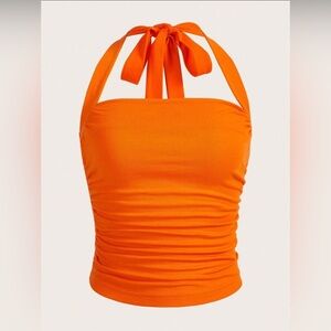 Bright orange halter top